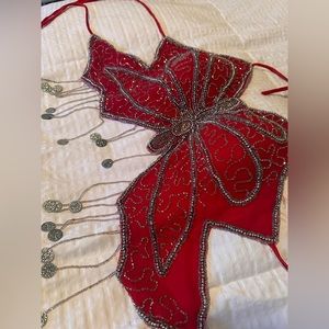 Gorgeous red beaded butterfly top with charm tassel details